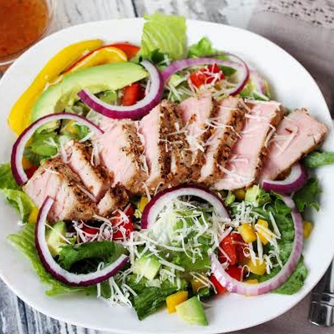 Ahi Tuna Sesame-Crusted steak with creamy dressing and Salad