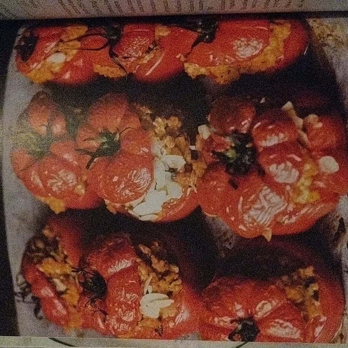 Roasted tomatoes with cinnamony millet and almonds
