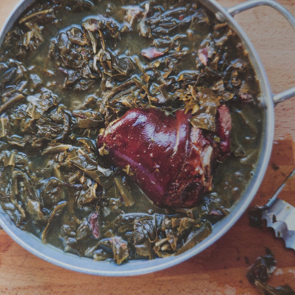 Stwed collard greens with ham hock