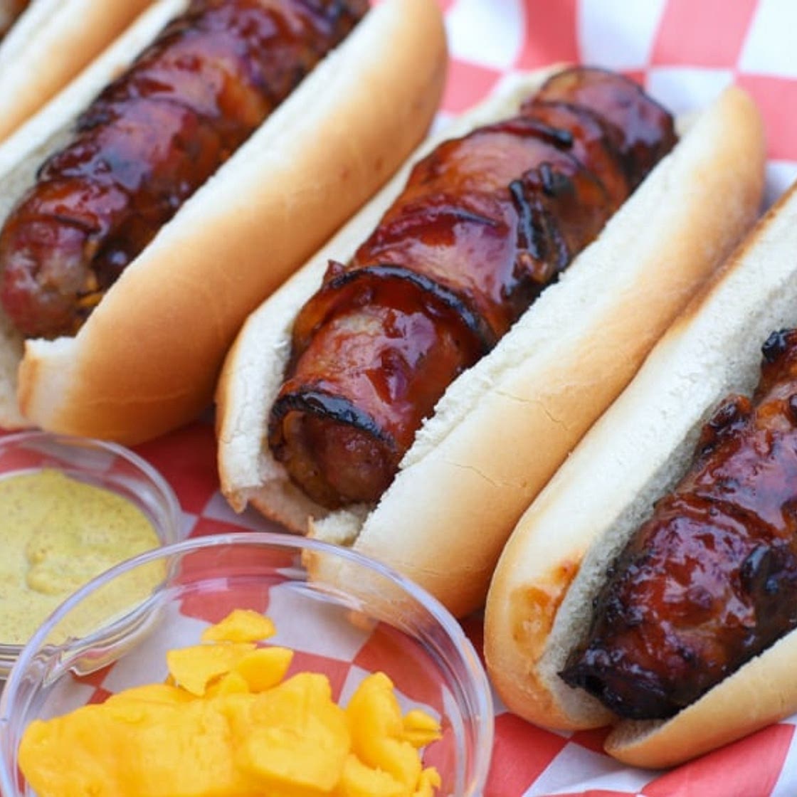 Cheese Curd Stuffed Bacon-Wrapped Brats