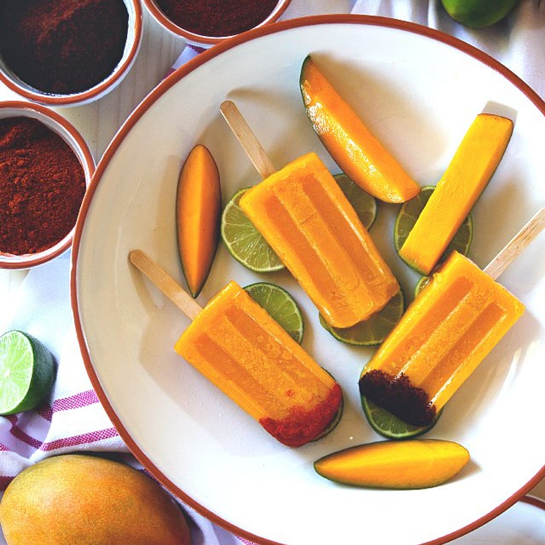 Tequila-Spiked Mango Popsicles