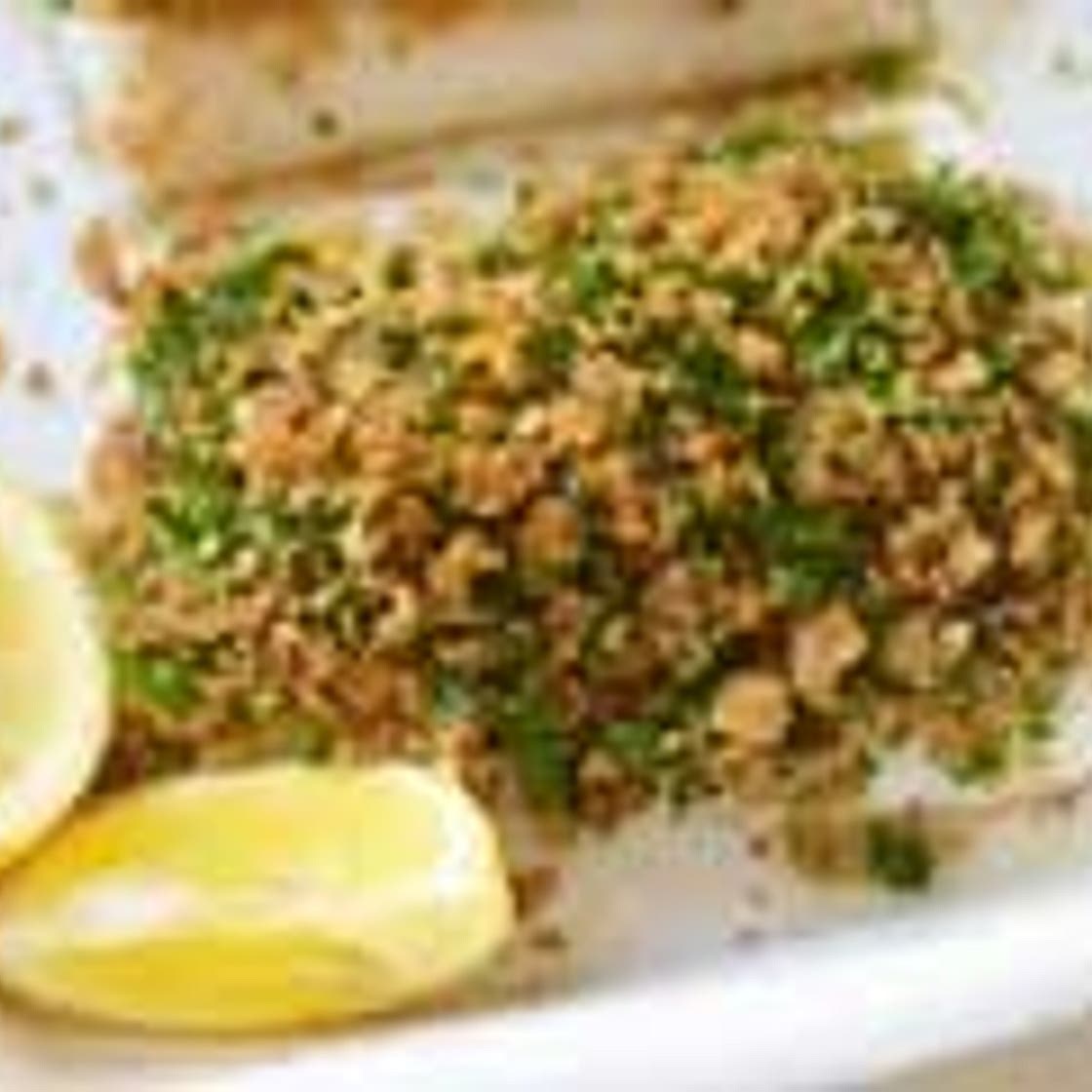 Baked fish with herby lemon crust
