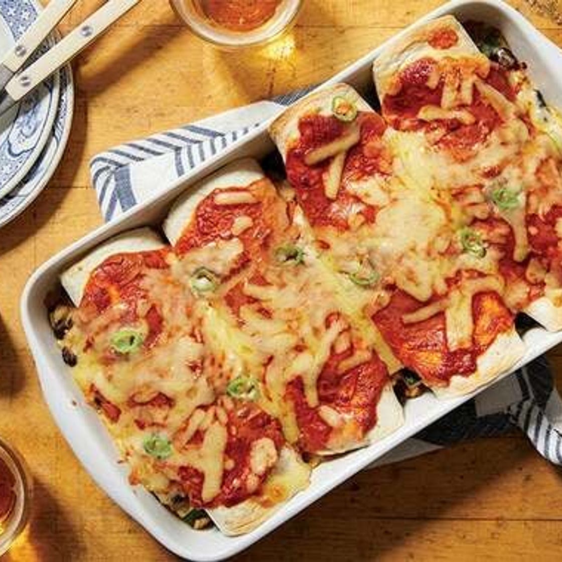 Black Bean & Zucchini Enchiladas with Cheddar Cheese