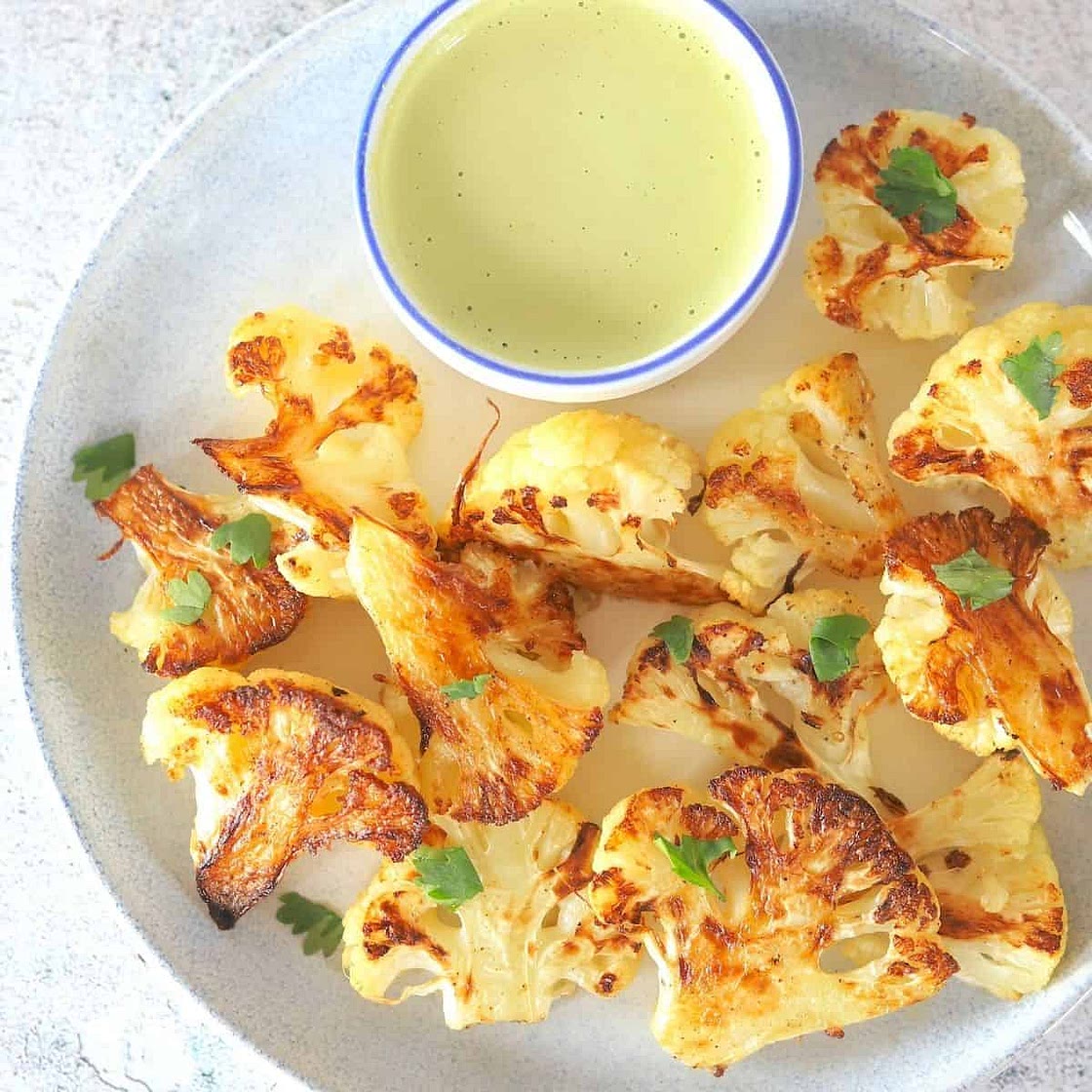 Roasted Cauliflower with Tahini Cilantro Dressing