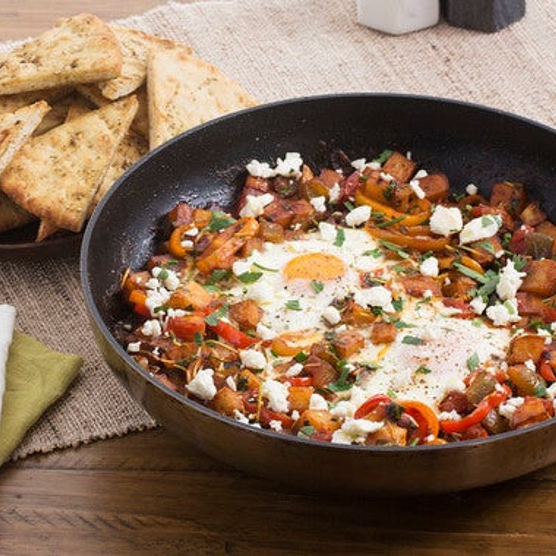 Summer Pepper & Potato Shakshuka with Pea Shoots & Spiced Pita Chips