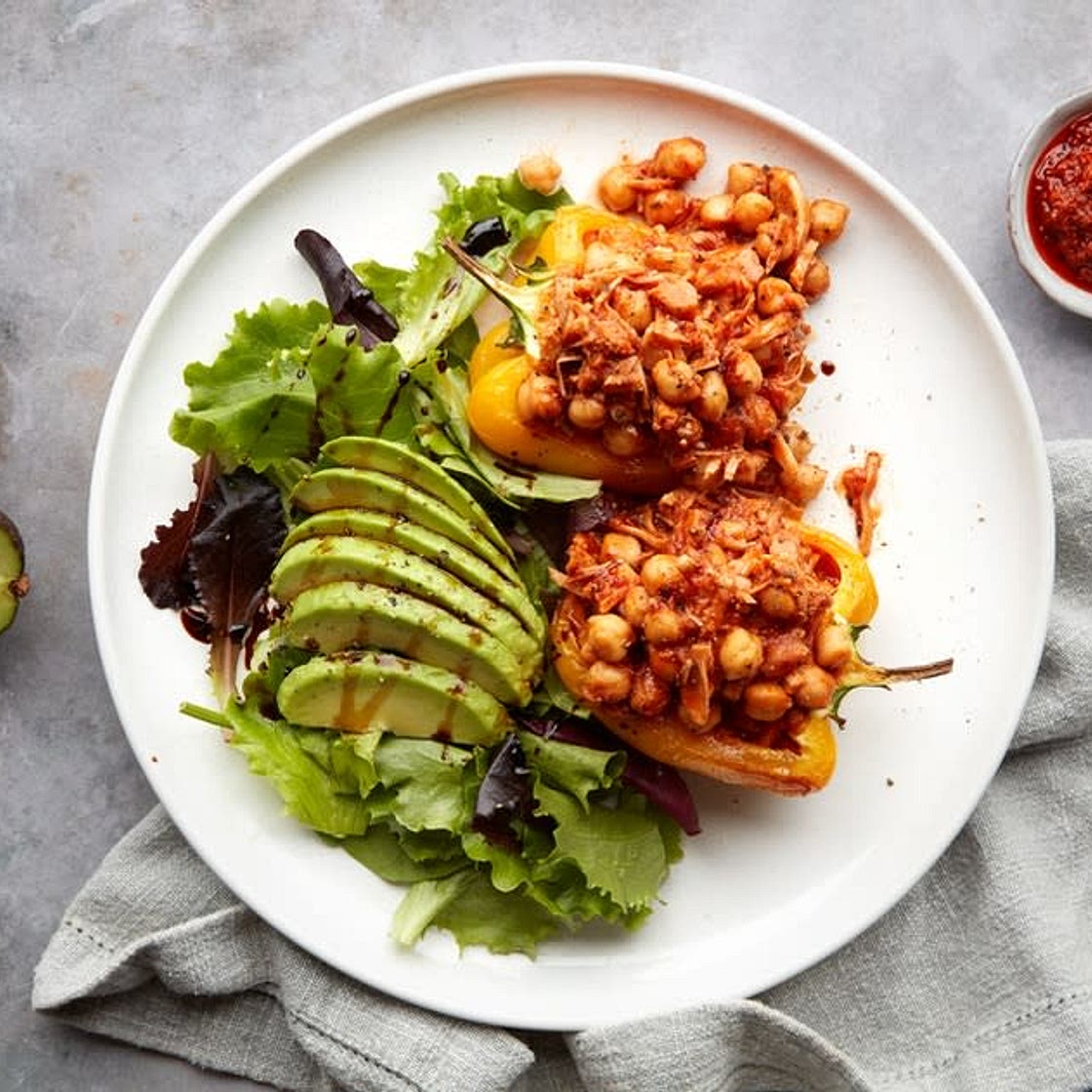 Red pesto jackfruit & chickpea stuffed peppers