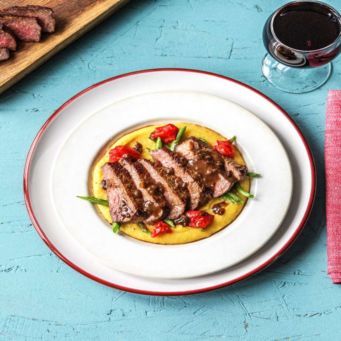 NY Strip Steak with Balsamic Reduction over Polenta, Blistered Tomatoes, and Green Beans