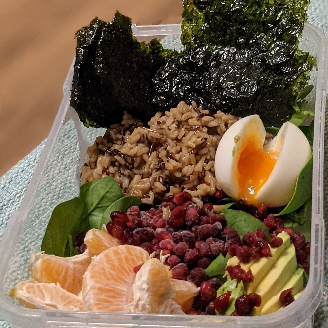 Buddha Bowl with Kale, Avocado, Orange and Wild Rice