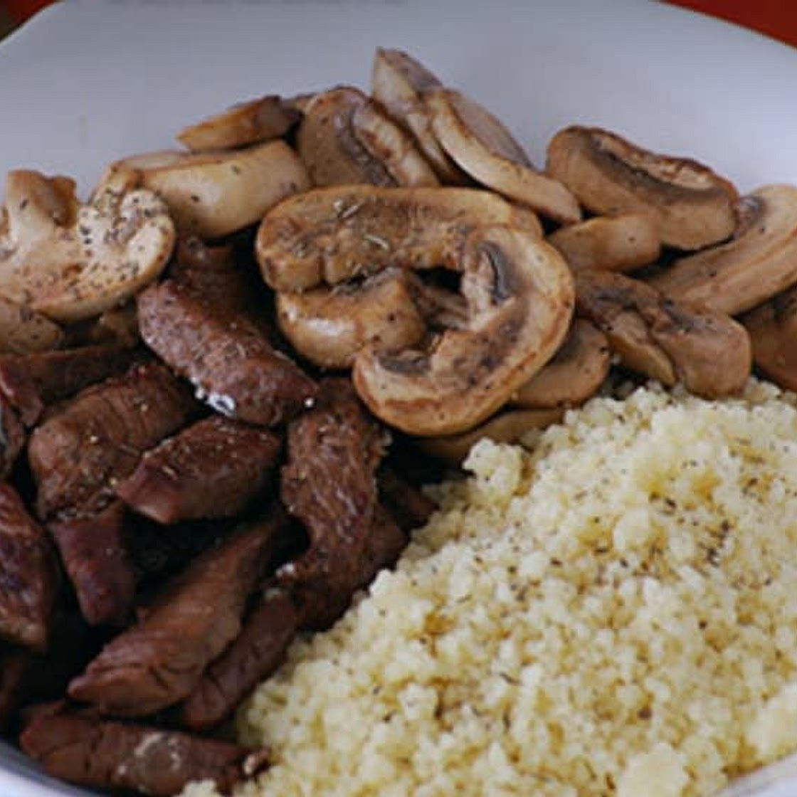 Ternera salteada con champiñones al balsámico.