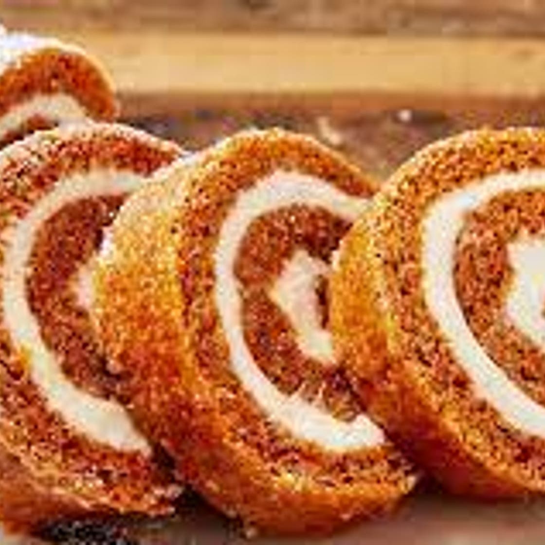 Pumpkin Roll with Vanilla Cream and Caramel Glaze