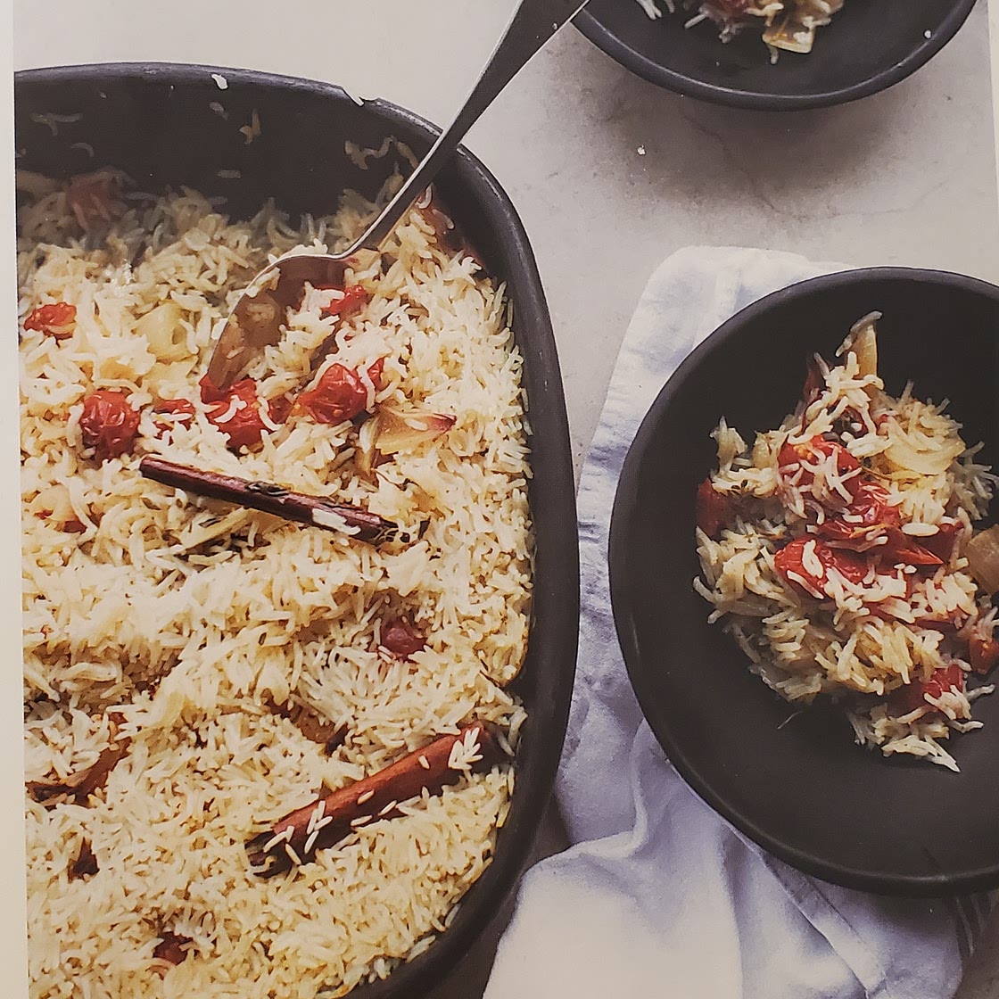 Baked rice with confit tomatoes and garlic