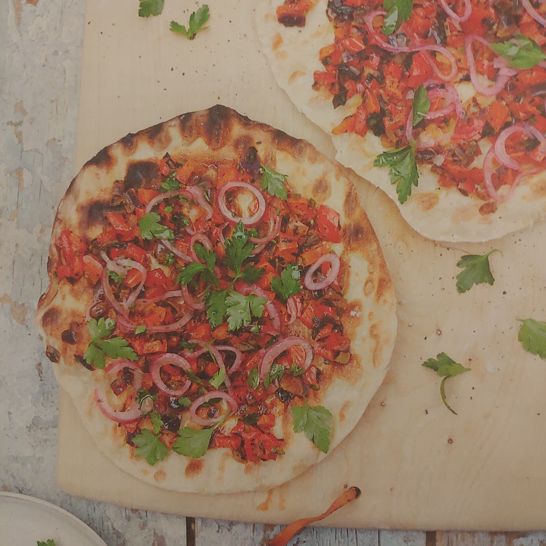 Frying-pan Turkish flatbreads with spoon salad