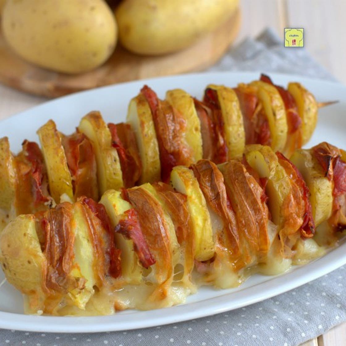 Spiedini di patate scamorza e speck