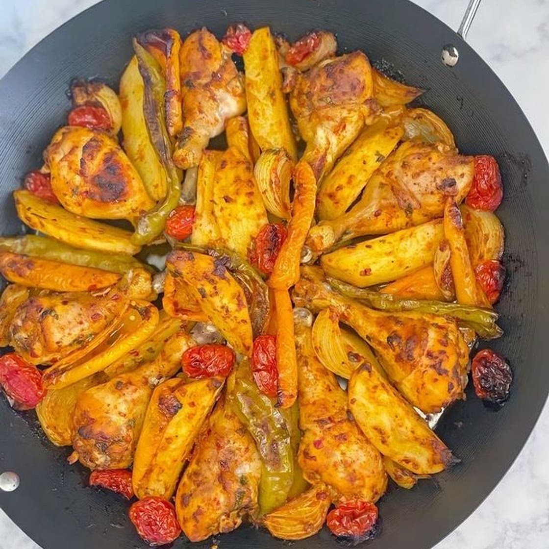 Baked chicken drumsticks with vegetables