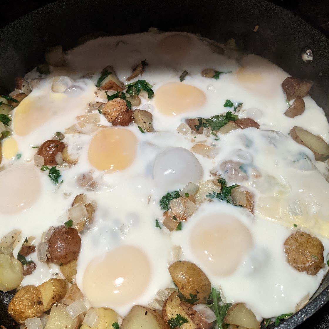 Fried potatoes & onions & eggs & cilantro & jalapeño & garlic