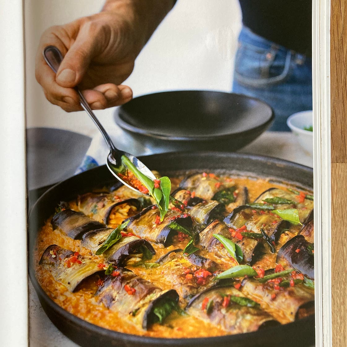 Stuffed aubergine in curry and coconut dal