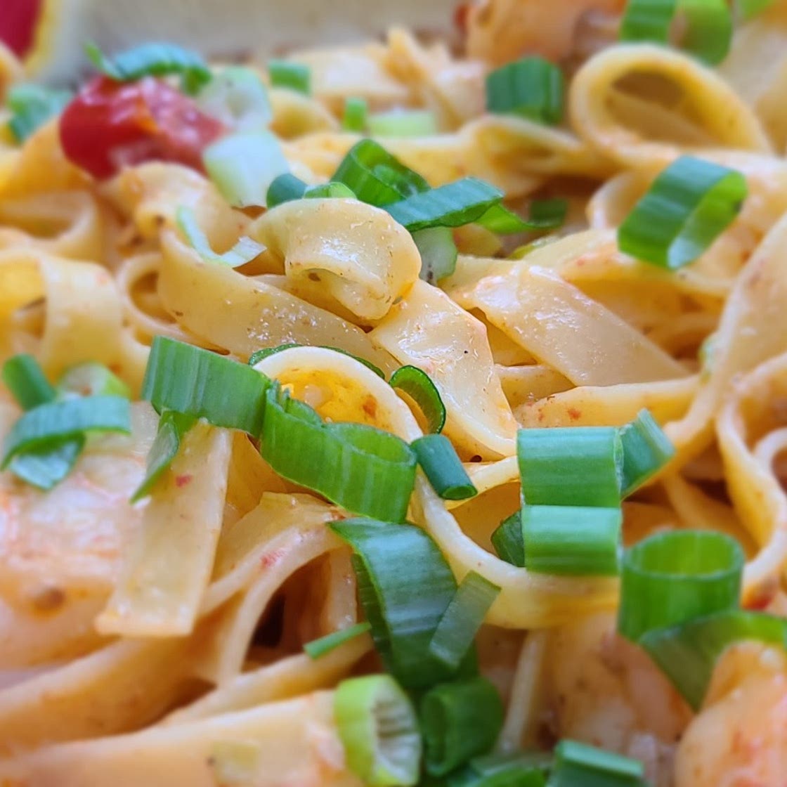 Creamy Shrimp Tagliatelle with Heirloom Tomatoes, Garlic, and Chili