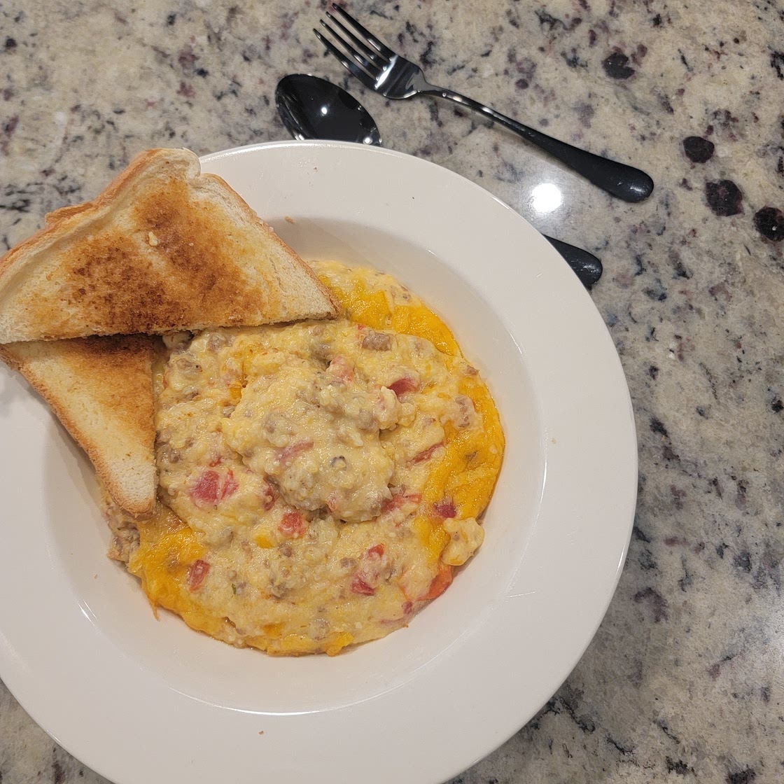 Rotel tomatoes, cheese Grits and Sausage "Bruncher"!