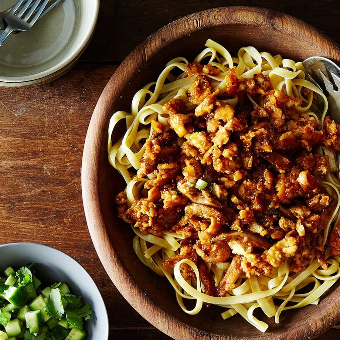 Spicy Garlic Noodles with Crumbled Tofu and Cucumber Salad
