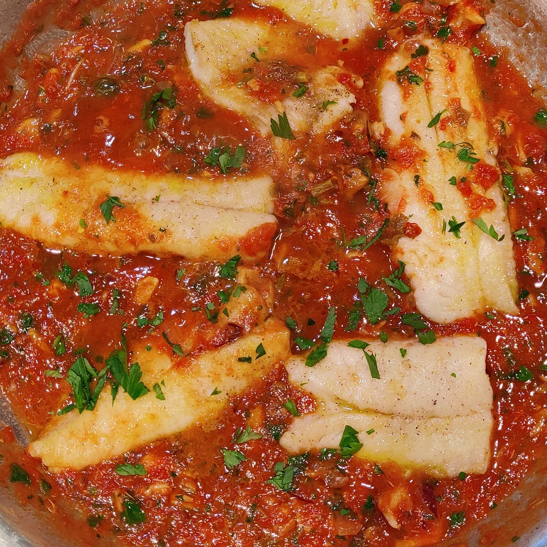 Triglie alla Genovese MUL IN TOMATENSAUS MET ANSJOVIS EN PORCINI