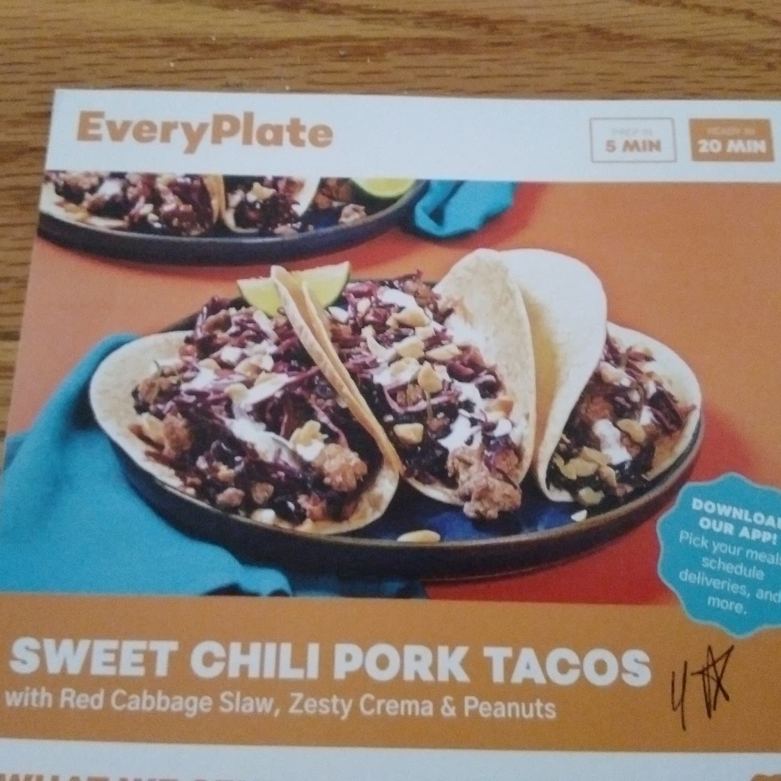 Sweet Chili Pork Tacos with Red Cabbage Slaw, Zesty Crema, & Peanuts