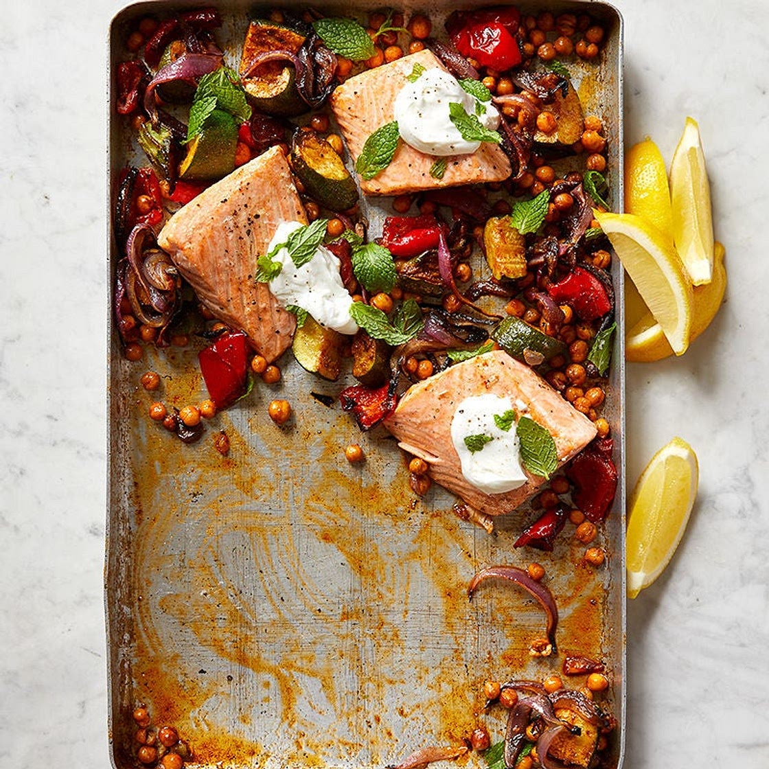 Roasted salmon with chickpeas, zucchini, and red pepper