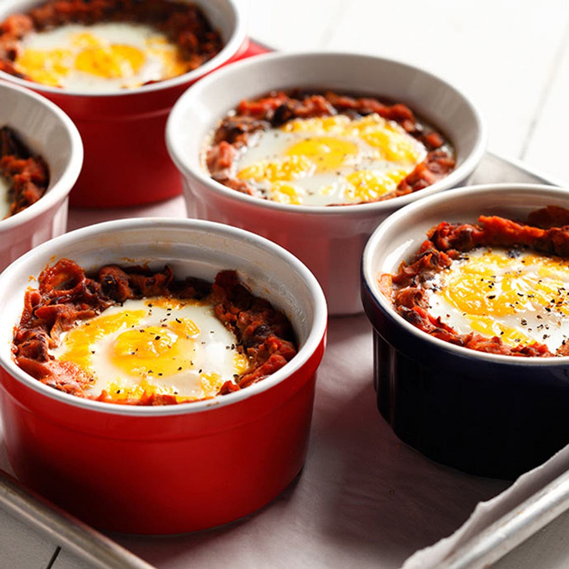 Mexican baked eggs on black beans