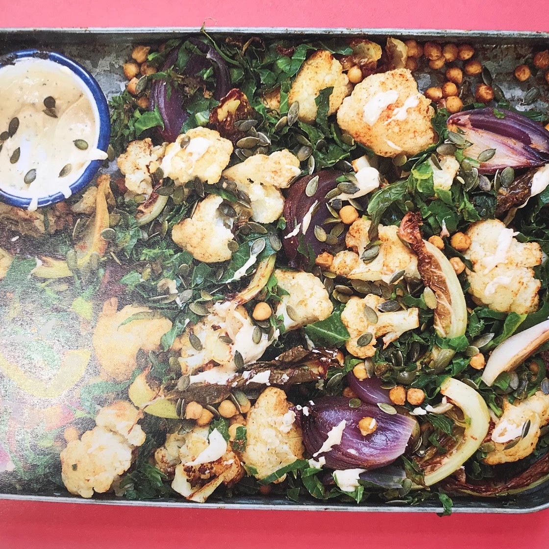 Roasted cauliflower with chickpeas, spring greens, lemon and tahini (vegan)