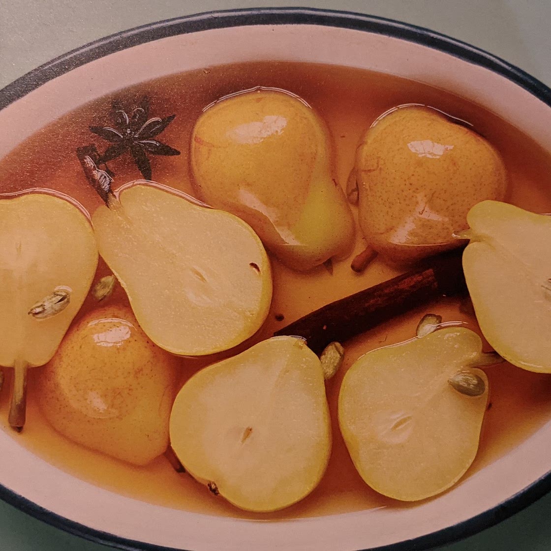 Spiced pears with almonds chocolate creme fraiche