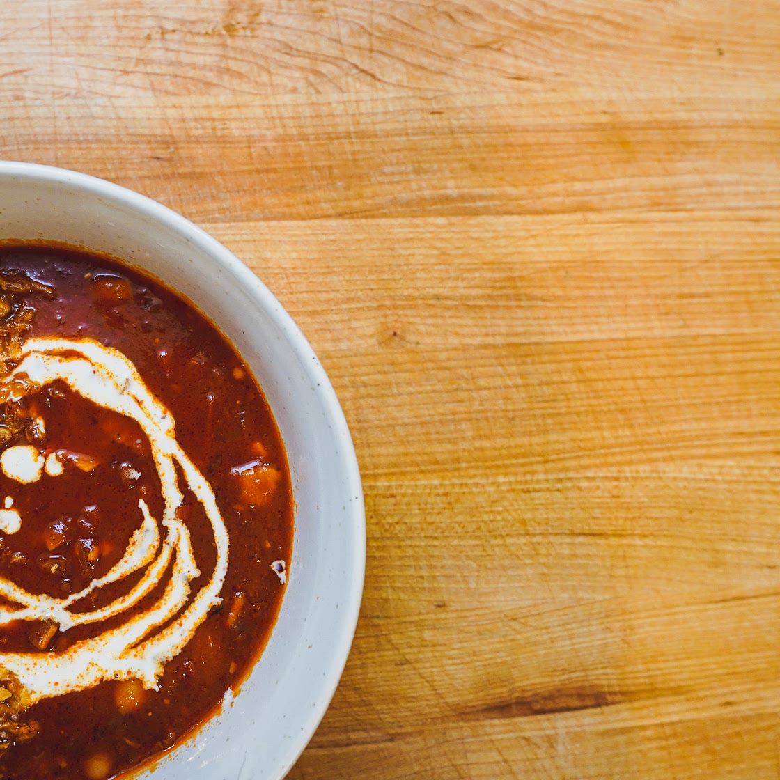 Tomato soup with white beans and bacon