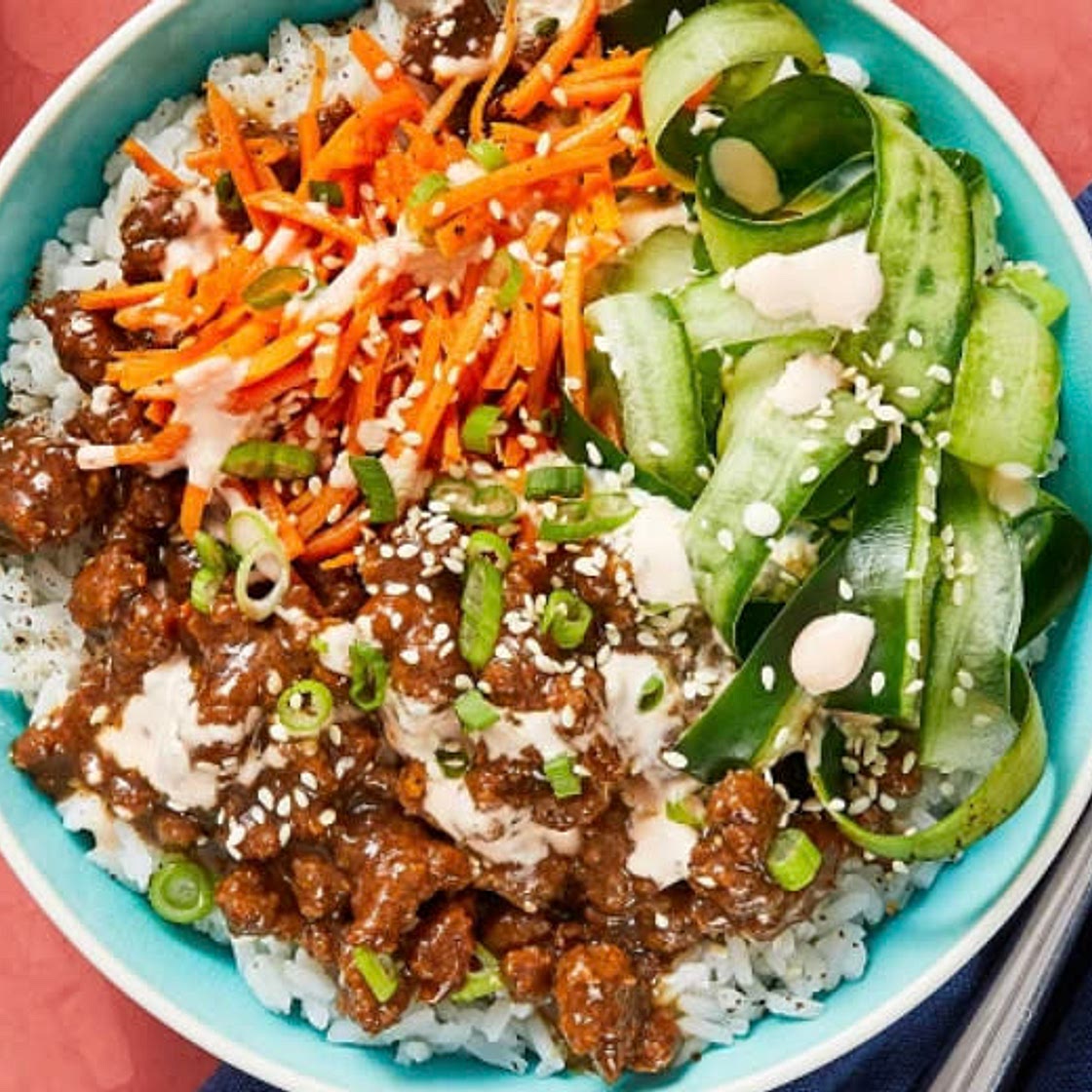 Pork Bulgogi Bowls with Carrots, Pickled Cucumber, & Sriracha Cr