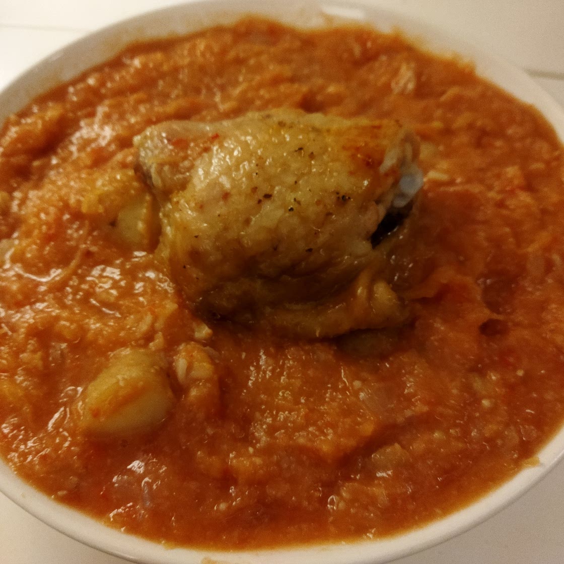 Tomato celery root spaghetti squash stew with baked chicken thighs