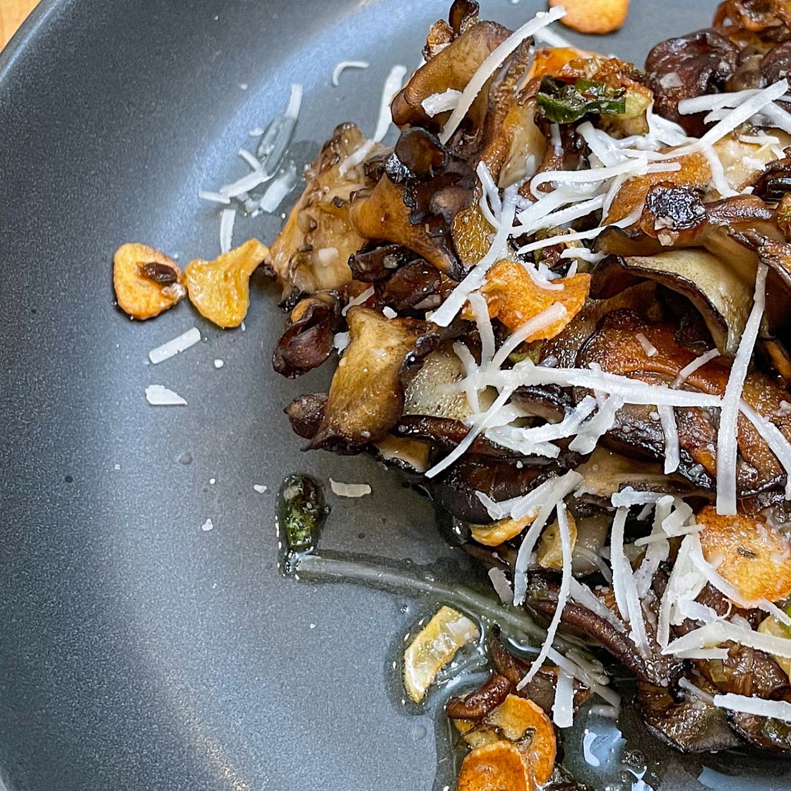 Miatake mushrooms with scallion and crispy garlic
