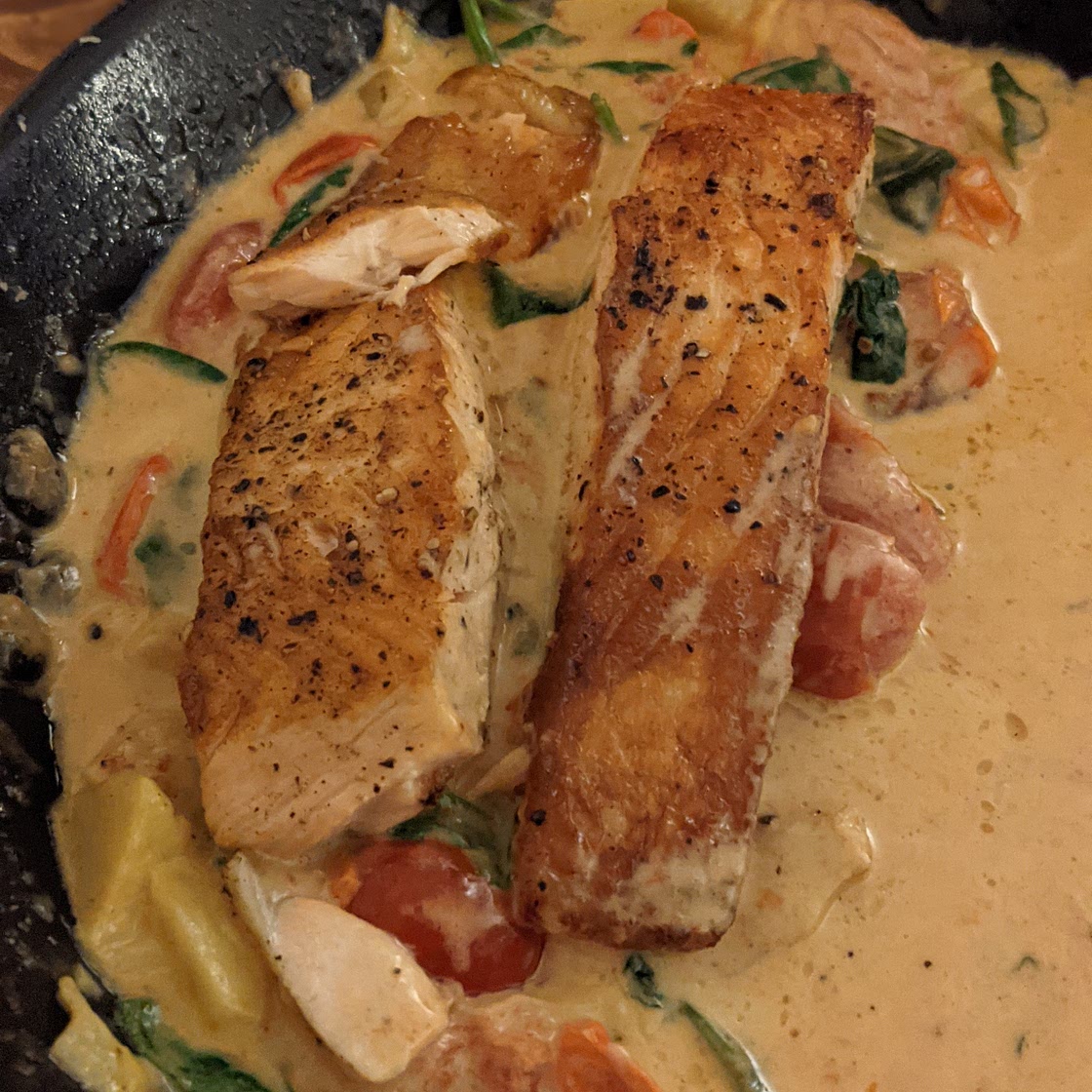 One-Pan Spinach and Artichoke Salmon with Tomatoes