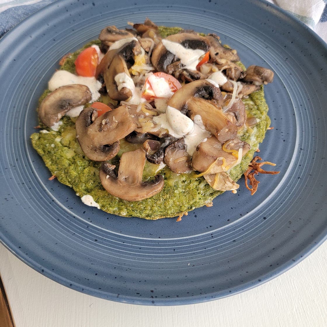 Spinach wrap with mushrooms and veggies