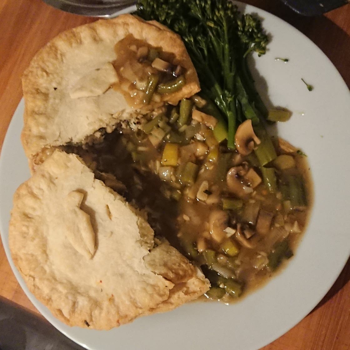 Trout, mushroom and leek pie with a vegetable broth
