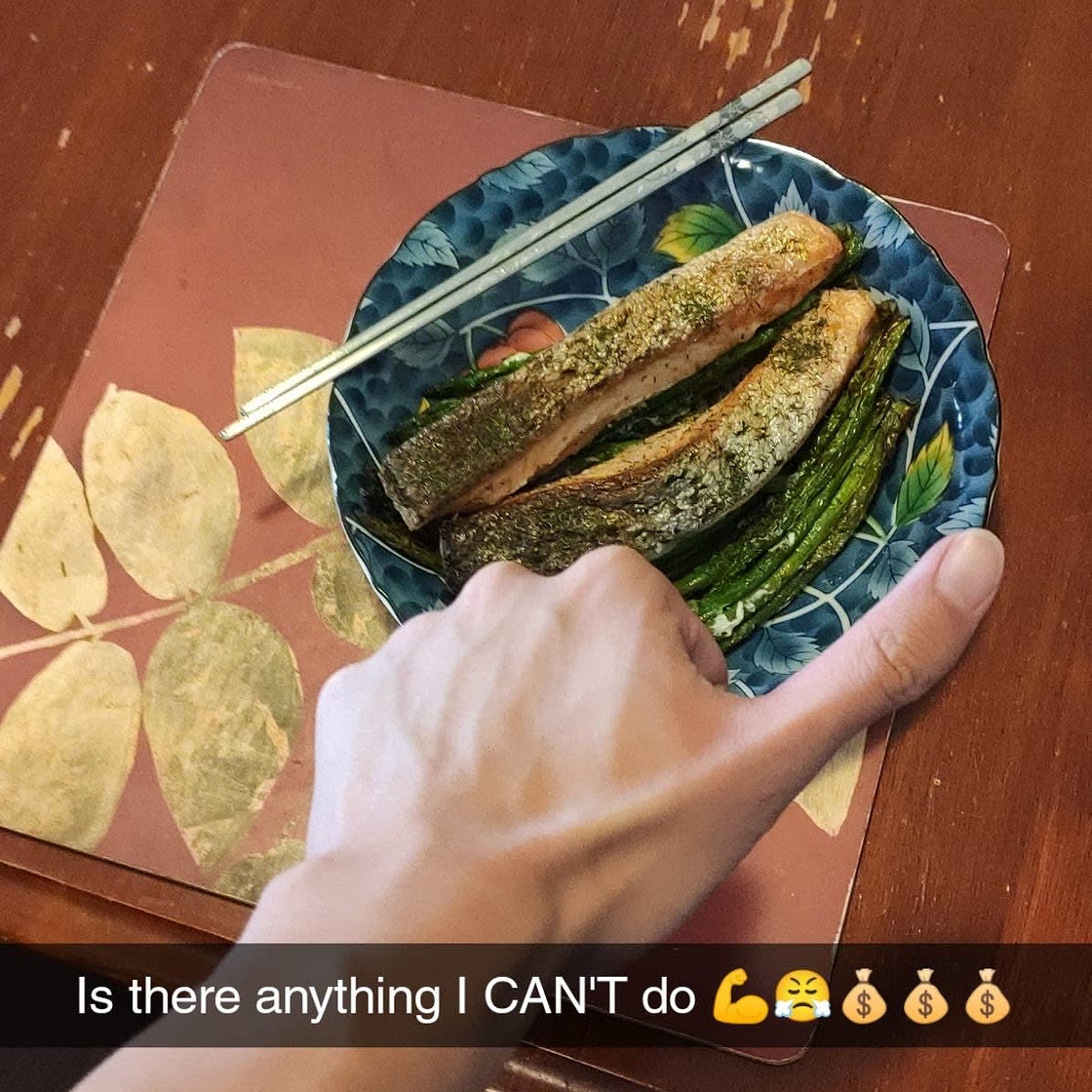 Salmon sleeping on a bed of Asparagus