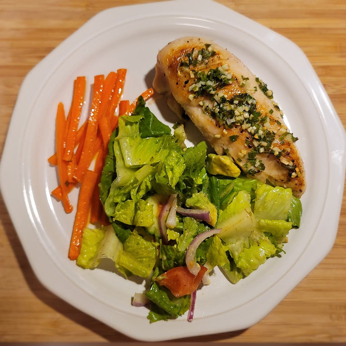 Roasted chicken breast with maple carrots