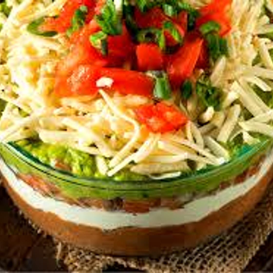 Mexican layered dip 10 serves 215 calories *