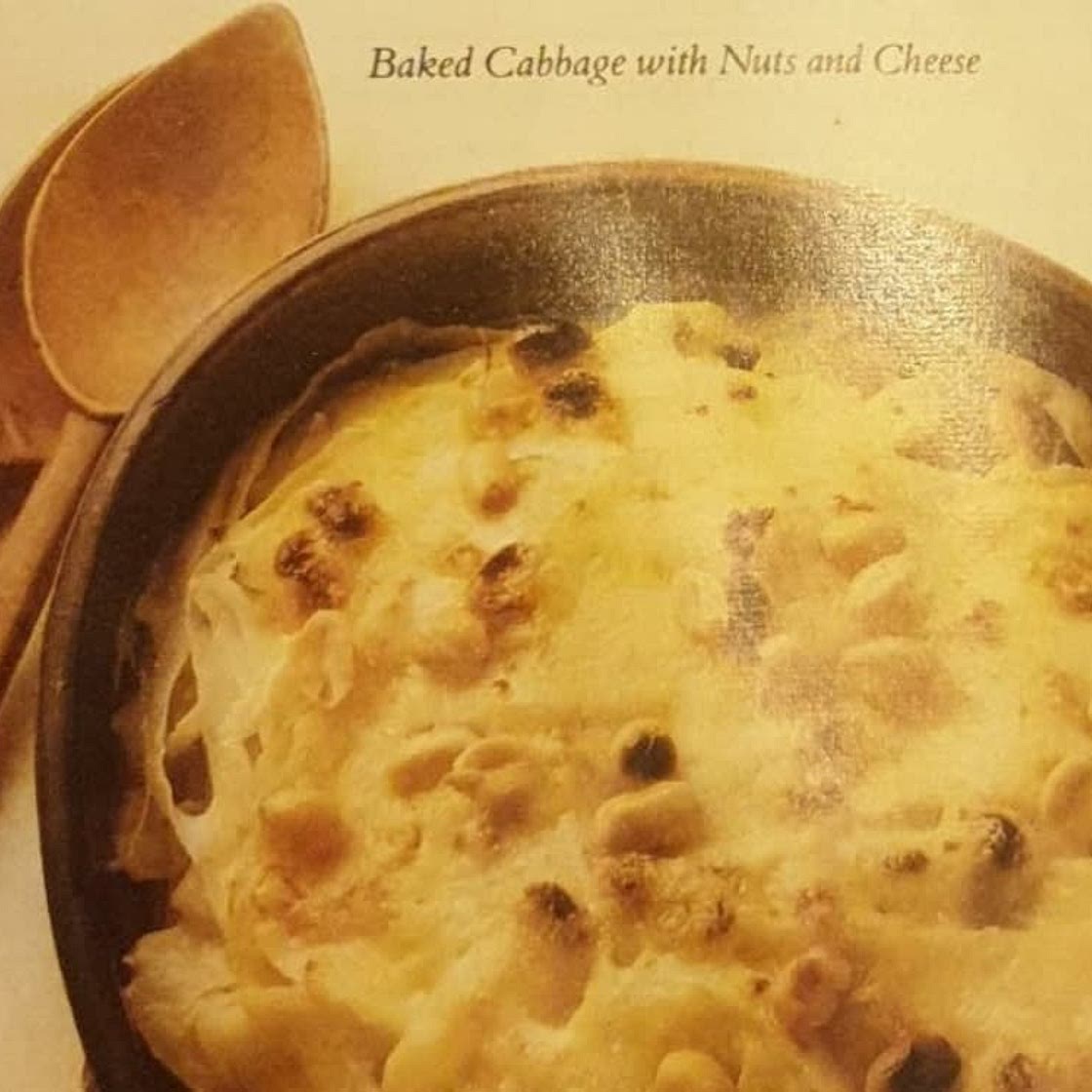 Baked cabbage with nuts and cheese