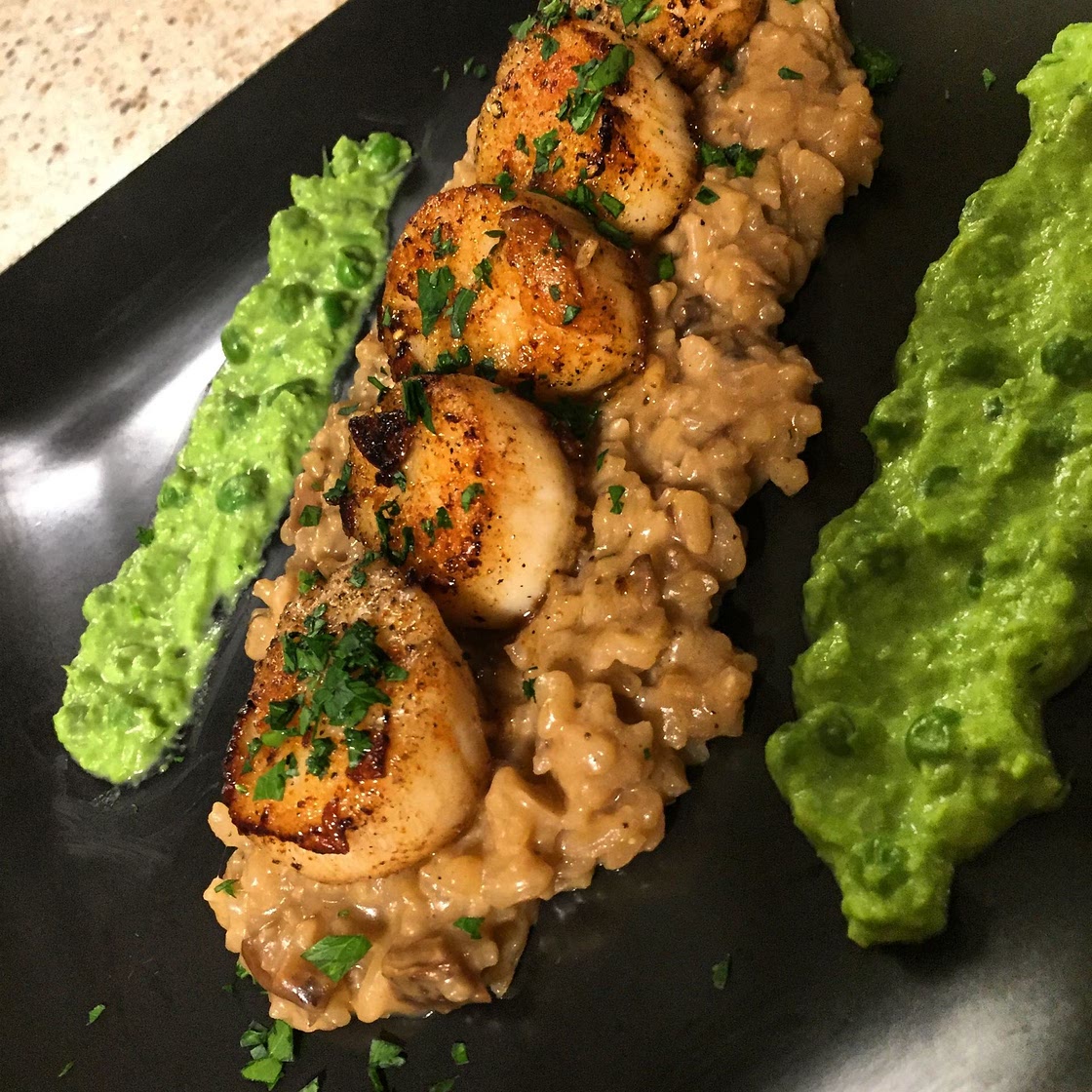 Scallops with Mushroom Risotto and Pea purée 