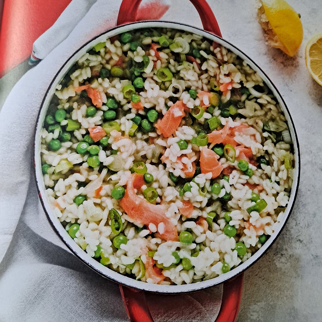 Oven-baked risotto with smoked salmon and peas