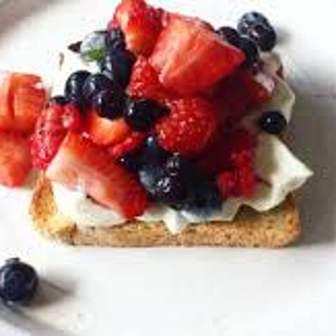 Breakfast bruschetta with cottage cheese and berry salsa