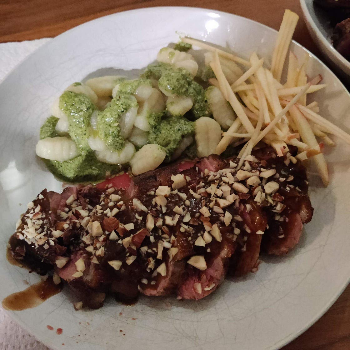 Duck breast with gnocchi and goat cheese pesto