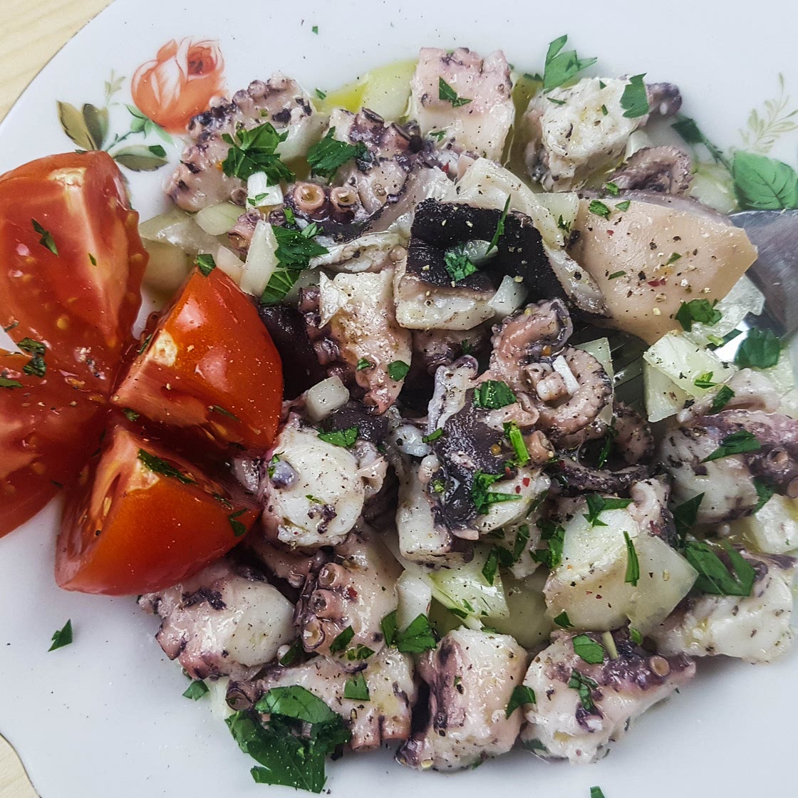 Octopus on salad (Croatian recipe)