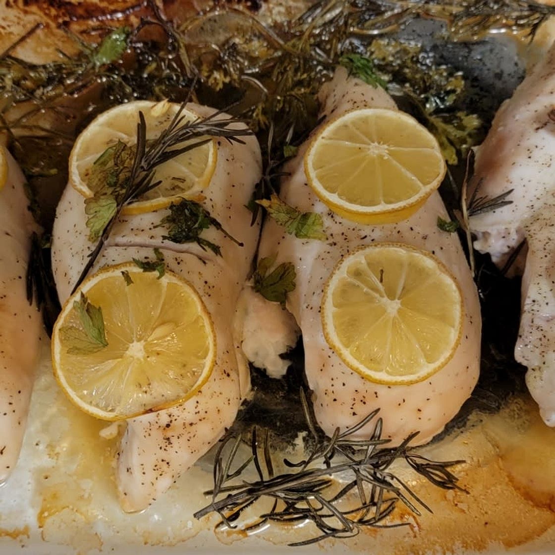 Baked chicken with lemon and fresh herbs