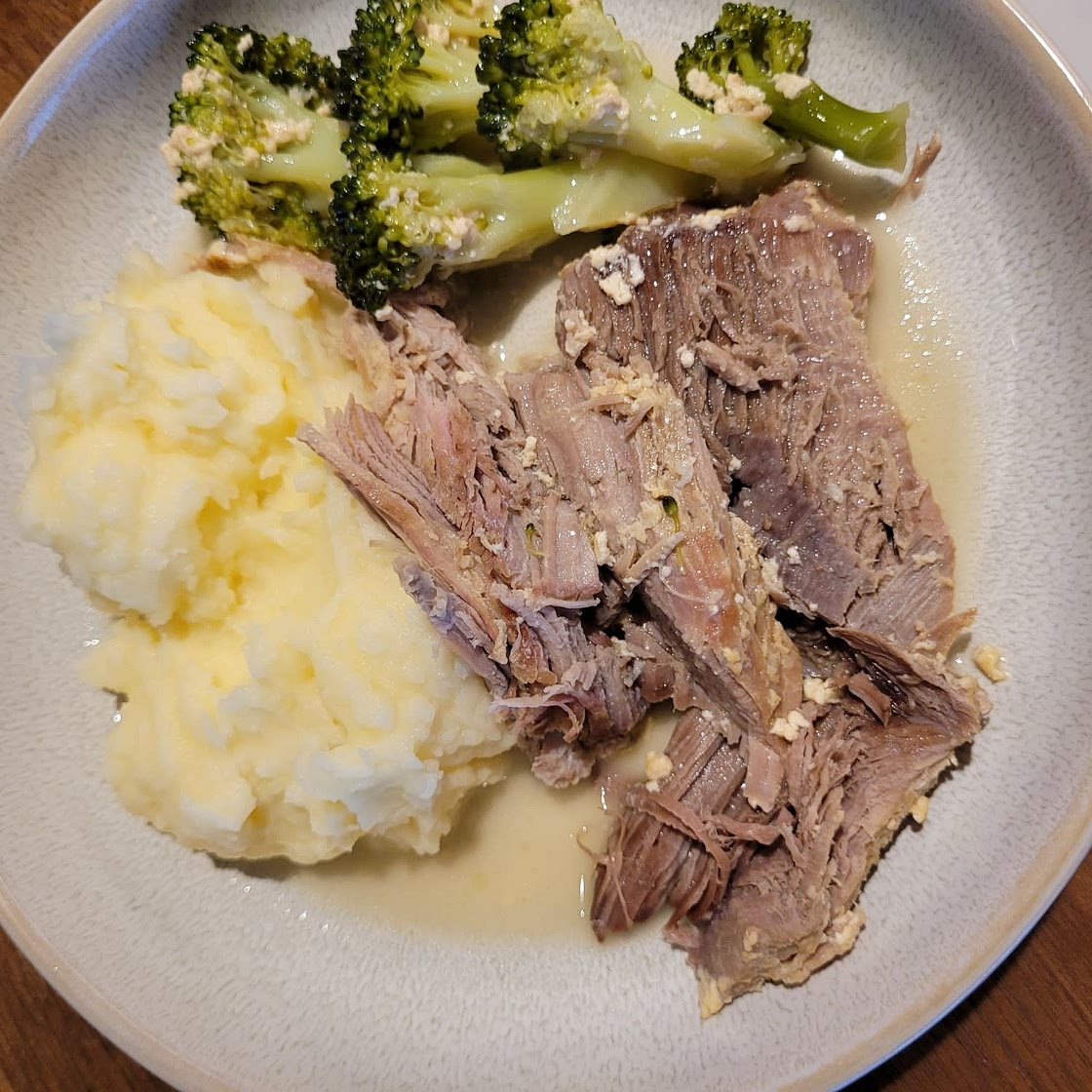 Pork cooked in milk with cloves