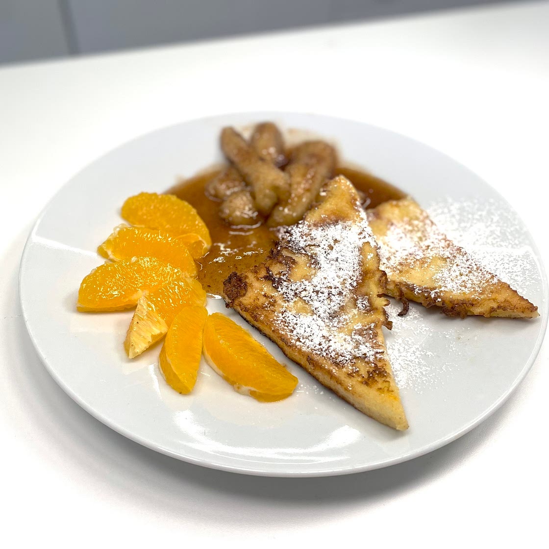 French toast with bananas in caramel