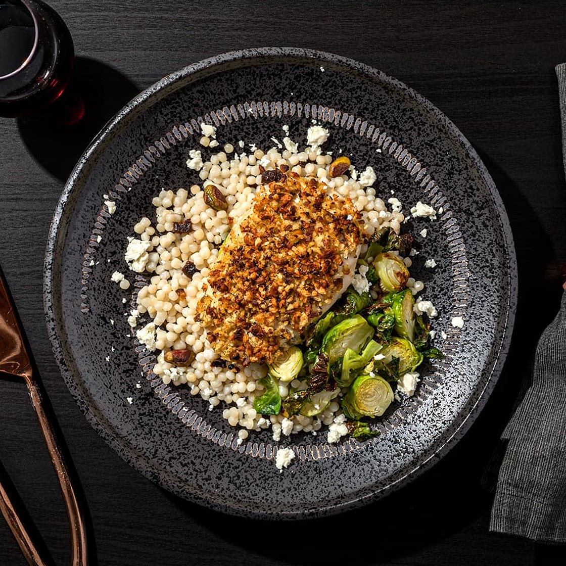 Pistachio-Crusted Chicken Breast with Brussels Sprouts, Israeli Couscous & Lemon Sumac Vinaigrette