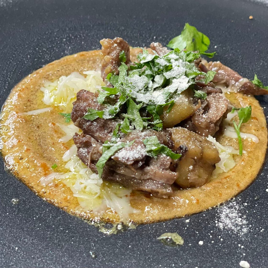 Braised short ribs tacos in dates sauce 